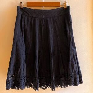 100% cotton a-line skirt with crochet lace hem